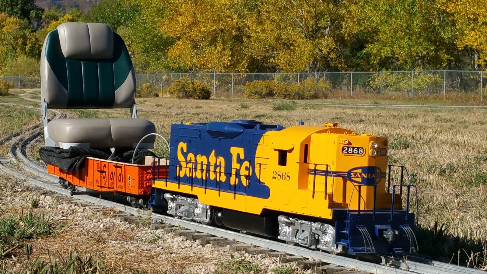 Rocky Mountain Rails members riding behind a locomotive